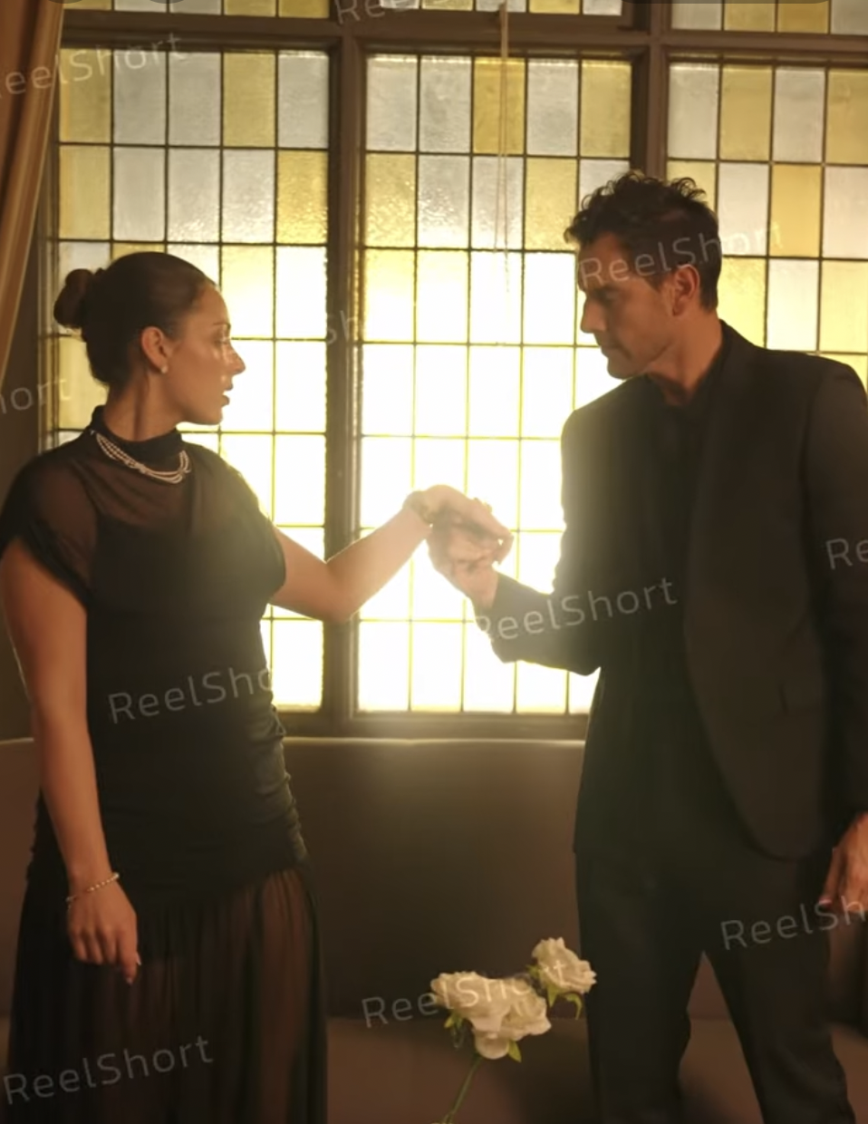 Rebecca Mary Schmautz as Elara Quinn and Jesse Morales as Jean Cole Vance in "The Billionaire and the Baby Trap" | Source: youtube/reelshortapp