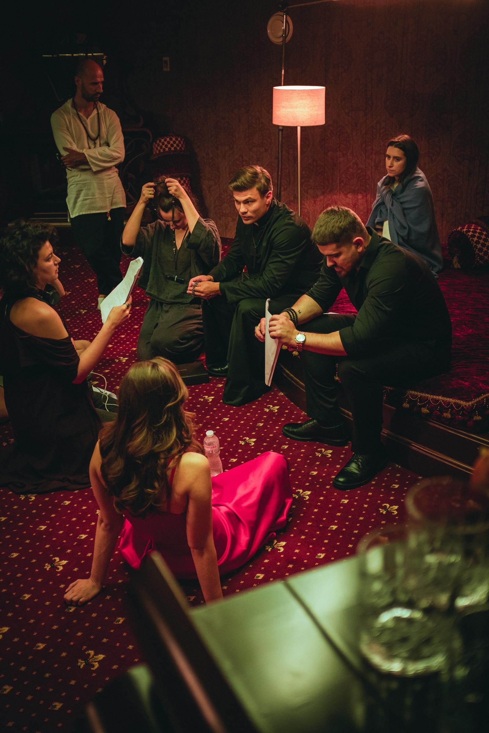Maksym Samchyk (Father Christopher Crow), Max Devizorov (Dante Crow), Oleksa Pankova (Lisa Stone), and the film crew prepare carefully for one of the series’ most intense scenes. | Source: AMO Pictures