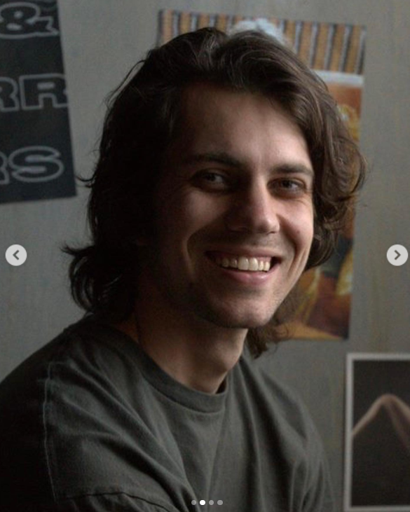 A close-up shot of Kyle Maddox in a relaxed setting, flashing a natural smile between scenes, as posted on March 6, 2023 | Source: Instagram/kyle_r_maddox