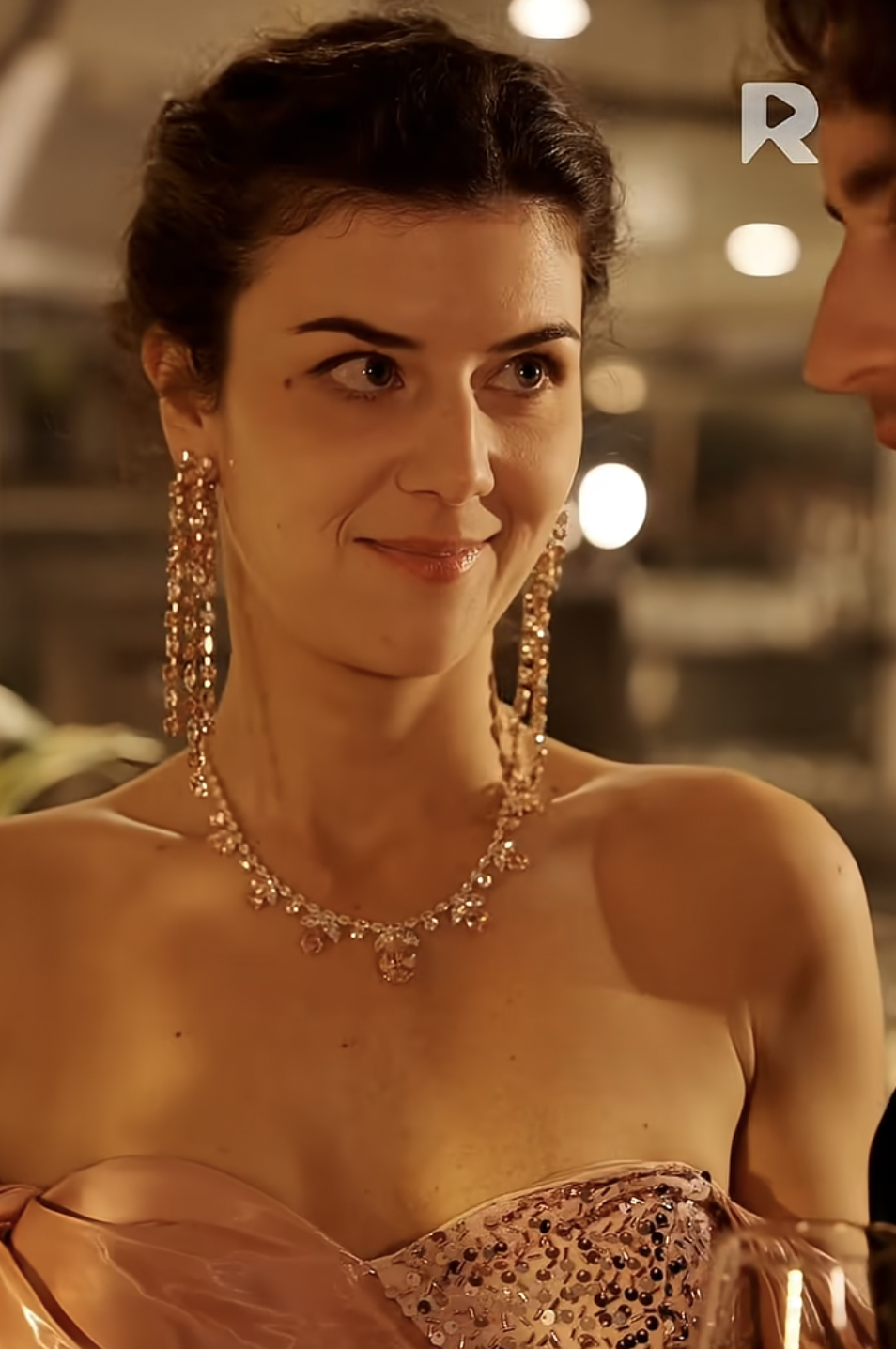 Ioana Damian as Maria in "Mafia Mamma's Hot Lover" | Source: youtube/reelshort