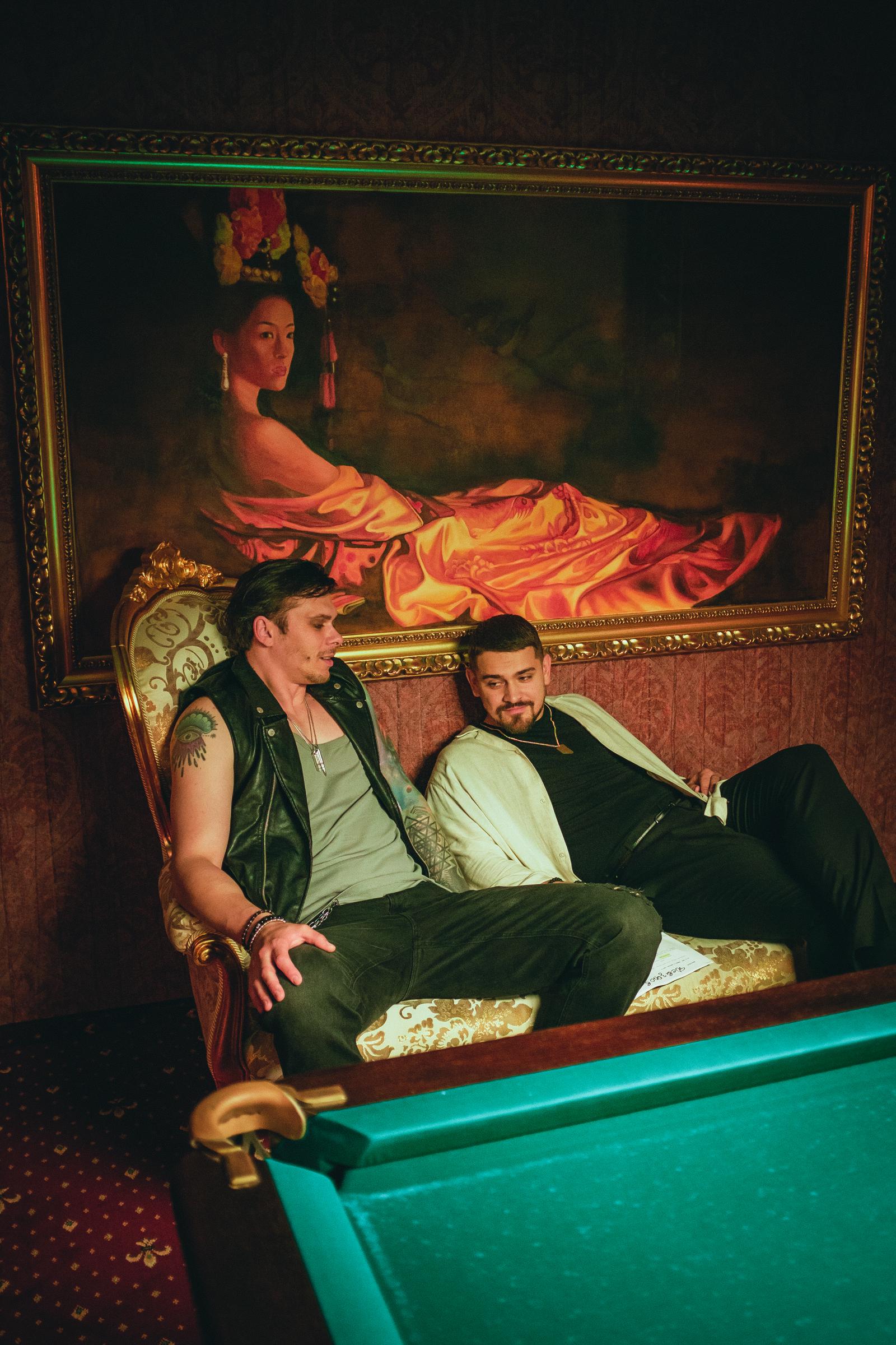 Max Devzorov (Dante Crow) and Anton Solovey (Luca Morelli) take a break between takes while filming one of the darker scenes in the billiard room. | Source: AMO Pictures