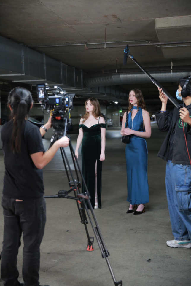 The cast and crew prepare a scene during the filming of "Legally Bound to Love" | Source: Madison Vice
