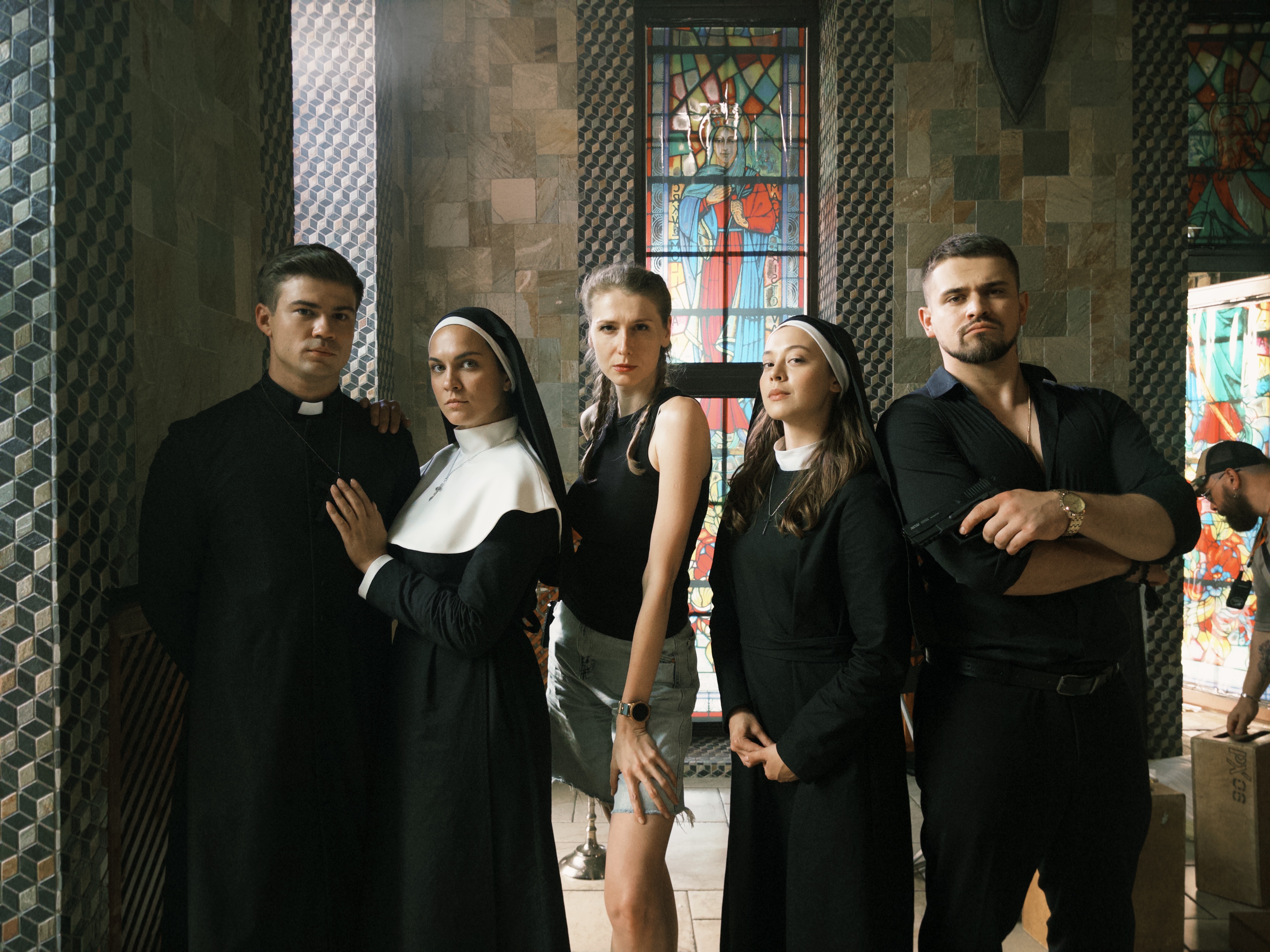 Director Alina Bukhtiyarova playfully poses with the cast of "His Holy Obsession": Maksym Samchyk , Stanislava Krasovska, Oleksandra Pankova, and  Maksym Devizorov, | Source: AMO Pictures