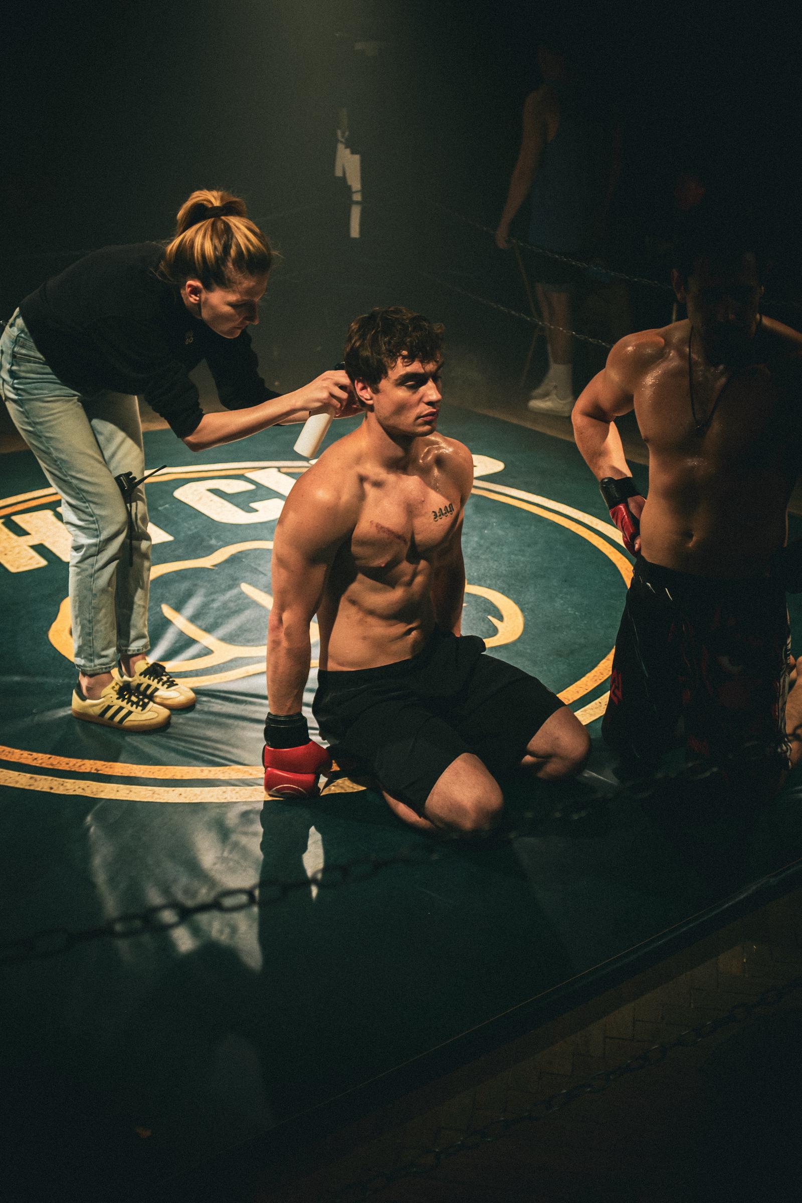 Makeup artist Anna Hrabko prepares Nazar Grabar between takes, ensuring continuity during physically demanding scenes. | Source: AMO Pictures