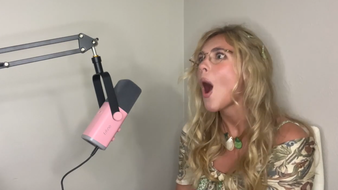 Ashley Michelle Grant reacts during her interview on acting like an actor while talking about receiving her first big payment, posted on September 12, 2024 | Source: YouTube/actinglikeanactor