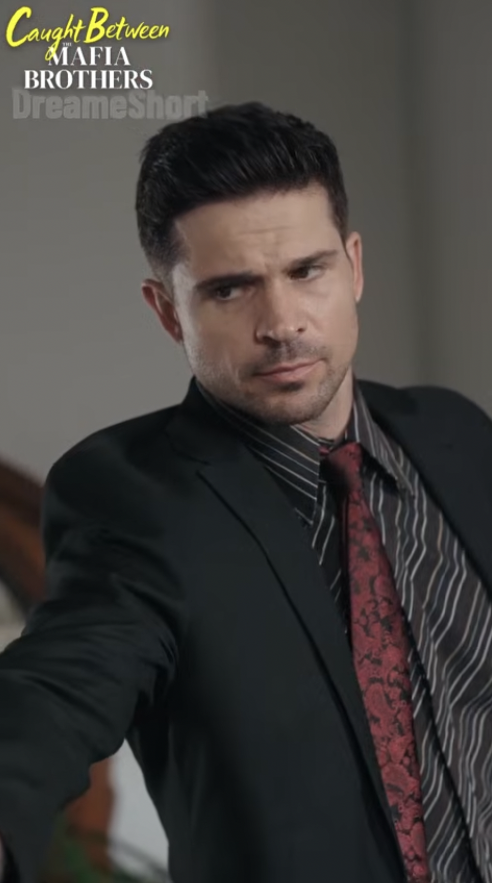 Michael Allen as Finn Moretti in "Caught Between the Mafia Brothers" | Source: youtube/dreameshort