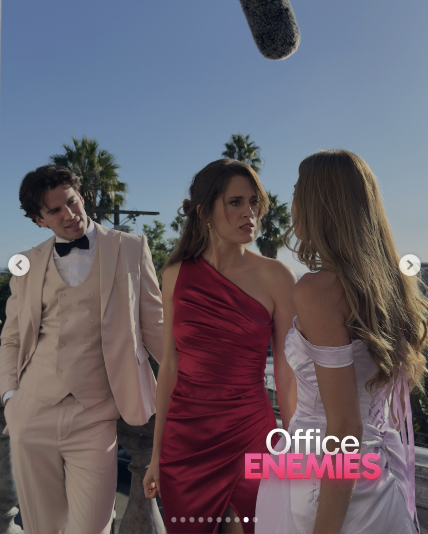 Noah Fearnley, Kelsey Maskell, and Rebecca Stoughton behind the scenes of "Office Enemies" | Source: instagram/app.shorts