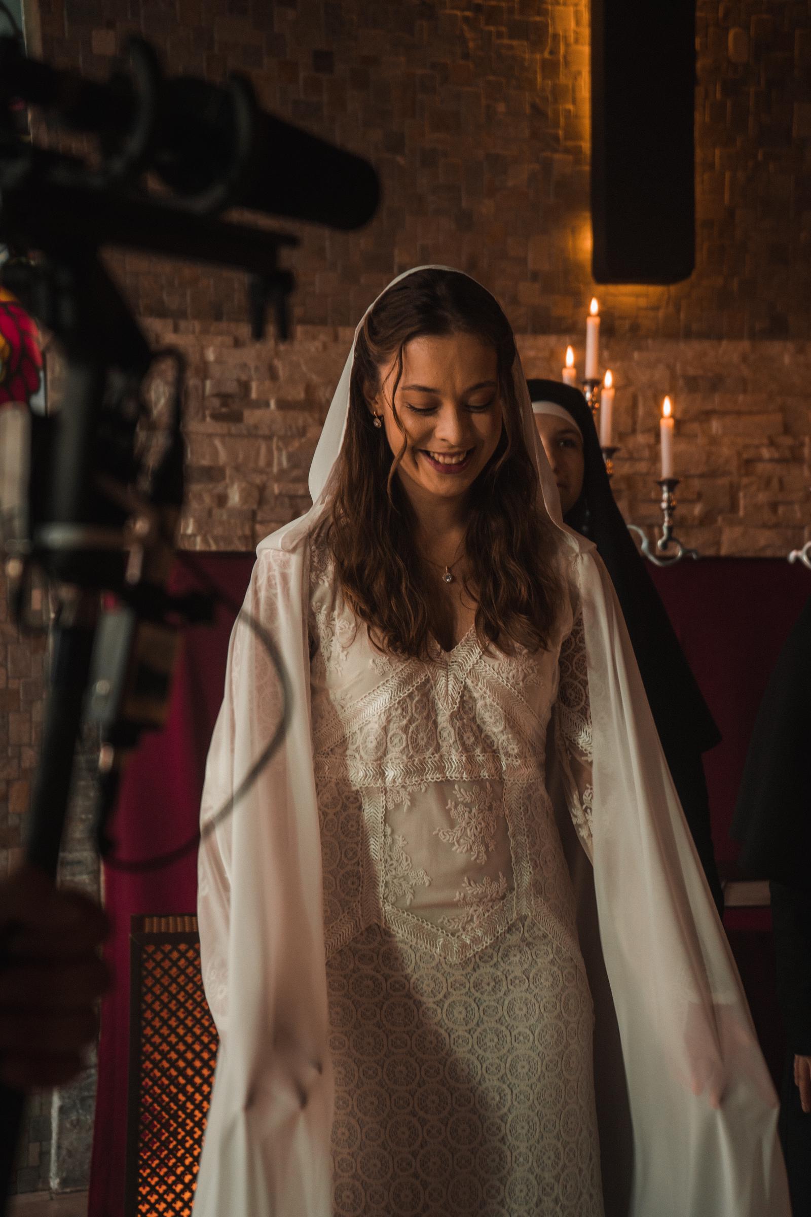 Oleksandra Pankova, who portrays Lisa, during a candid moment on set | Source: AMO Pictures