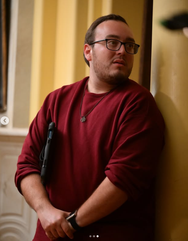 Matt Macedo on set, observing a scene with focus and intent during the production of a vertical drama, as posted on May 21, 2024 | Source: