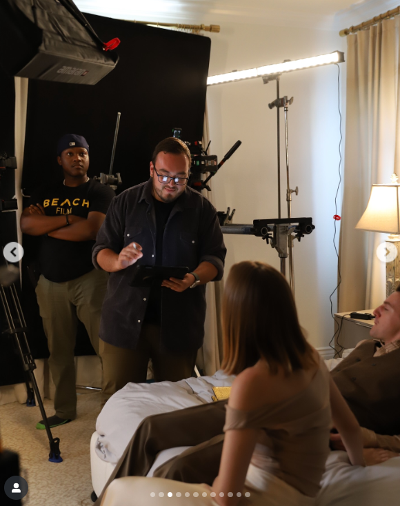 Matt Macedo reviews a scene setup with actors on set, as posted on September 24, 2025 | Source: Instagram/mattmacedo